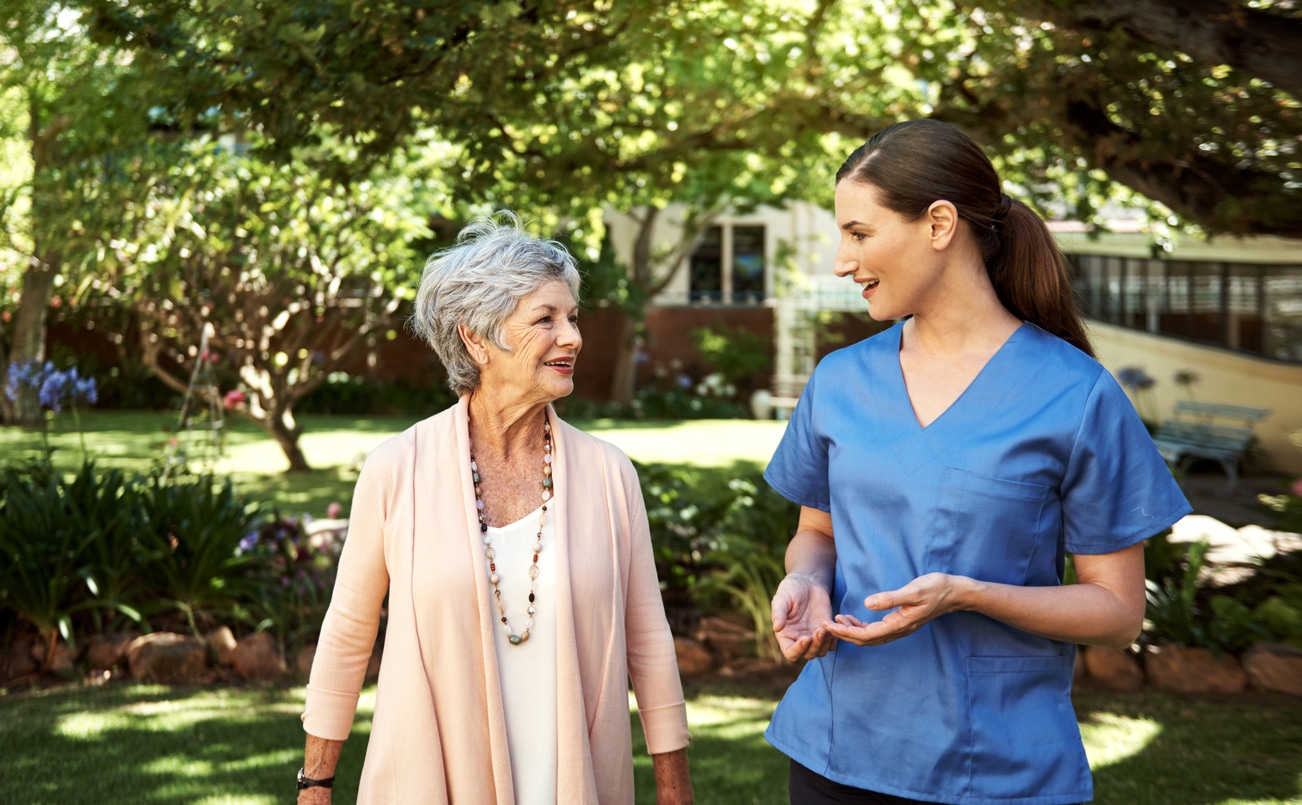 nurse-giving-tour-of-assisted-living-facility