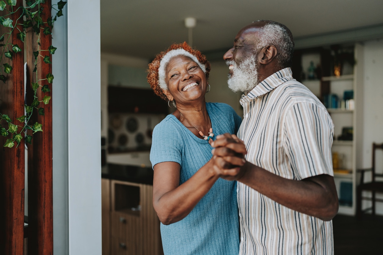 elderly-couple-dancing-in-house